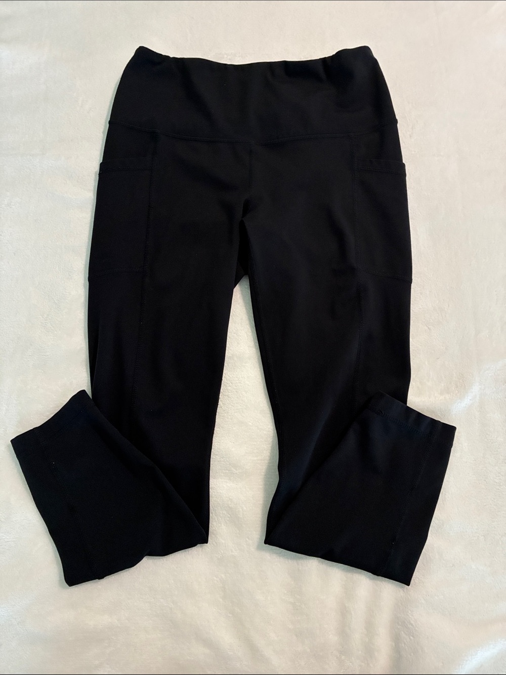 Black High-Rise Capri Leggings with Side Pockets — Women